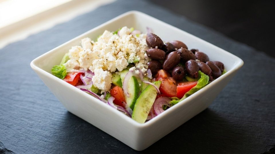 Greek salad with feta, kalamata olives, tomatoes and cucumbers